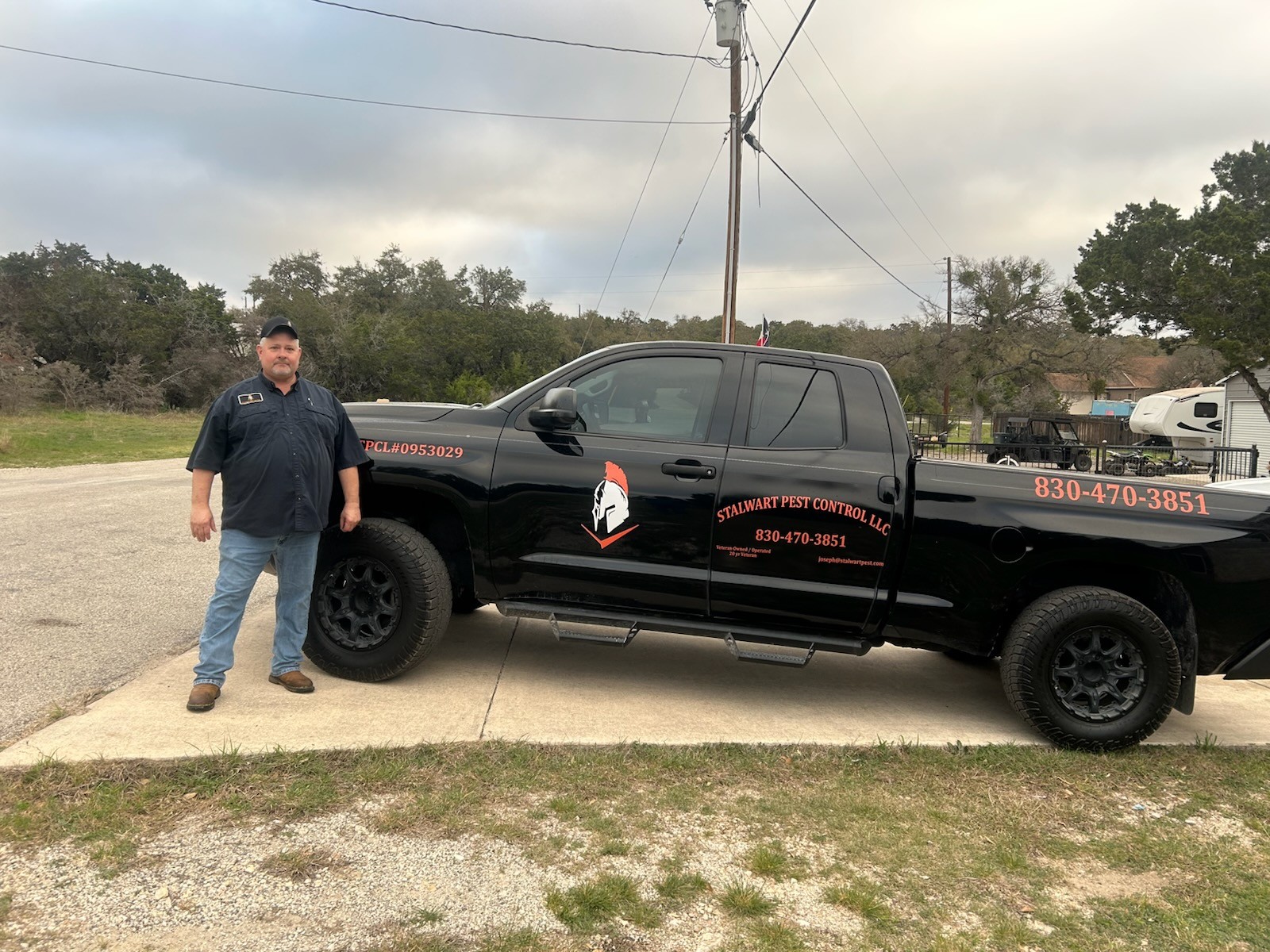 Joe with the Stalwart Pest Control truck in Spring Branch, TX